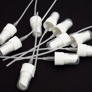100 New  White Plastic Caps Fine Mist Sprayers Only Fits 24/410
