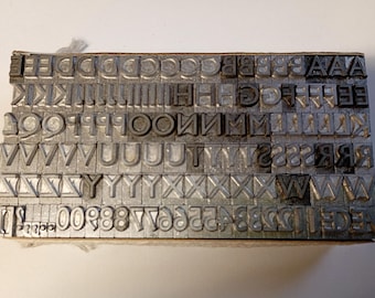 24 puntos GILL SANS Medium MAYÚSCULAS, Tipo de impresión tipográfica en metal