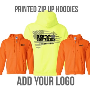 May include: Two orange zip-up hoodies with a small logo on the left chest and one bright yellow zip-up hoodie with a larger logo on the back. The logo is black and white and says "IGY Construction" with a phone number and the words "Veteran Owned & Operated".