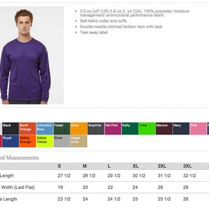 Pode incluir: Uma camisa de manga comprida roxa com uma tabela de tamanhos que mostra as medidas em polegadas para diferentes tamanhos. A tabela inclui o comprimento do corpo, a largura do peito e o comprimento da manga.