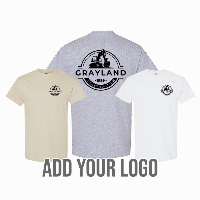 May include: Three t-shirts in beige, gray, and white, each featuring a circular logo with the text "GRAYLAND CONSTRUCTION 1999." The back of the gray shirt displays a larger version of the logo. The phrase "ADD YOUR LOGO" is at the bottom.