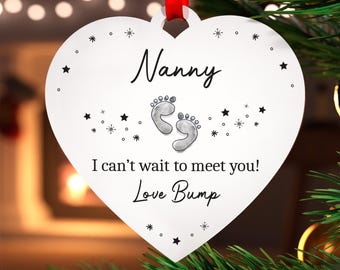 Personalised Nanny Christmas Gift From Bump; White Acrylic Heart Tree Ornament With Red Bag