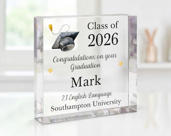 May include: A clear acrylic block keepsake featuring a printed graduation cap illustration, the text Class of 2026, Congratulations on your Graduation, the name Mark, and the degree details 2.1 English Language Southampton University.