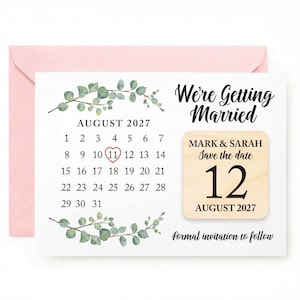 May include: A wedding save-the-date card with a pink envelope. The card displays a calendar for August 2027, with the 11th circled. Text includes "We're Getting Married" and "Mark & Sarah, Save the date, 12 August 2027."