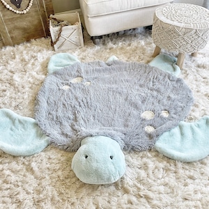 Sea turtle decorative nursery rug. Plush turtle stuffed decor for kid room. Ocean nursery theme. Light gray accent rug. Baby shower gift.