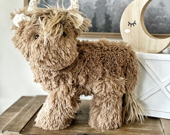Brown Highland Cow Plush with Faux Fur and Crochet Accents for Nursery