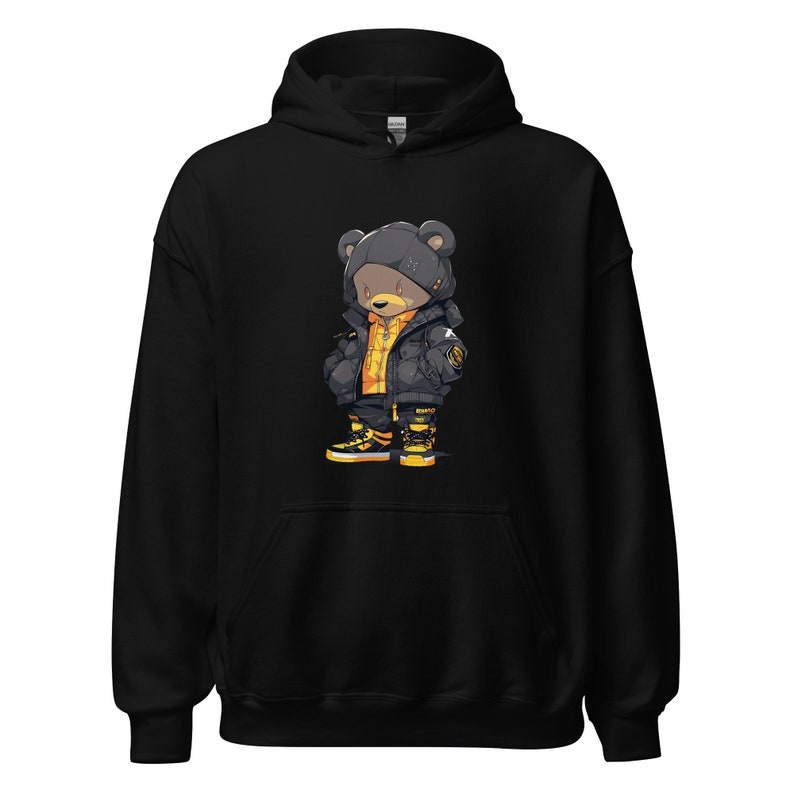 May include: Black hoodie with a cartoon illustration of a bear wearing a black and yellow jacket and black and yellow sneakers.