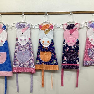 Unicorn girl&#39;s apron, animal face apron, horn, fantasy, pink, green, dots, gold, flowers, buttons, bookmark, cooking apron, costume, play
