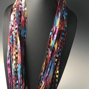 Italian Ladder Ribbon Scarf, Teal, Burgundy, Purple, Dark Gold and Blue. These scarves are a great addition to any wardrobe.
