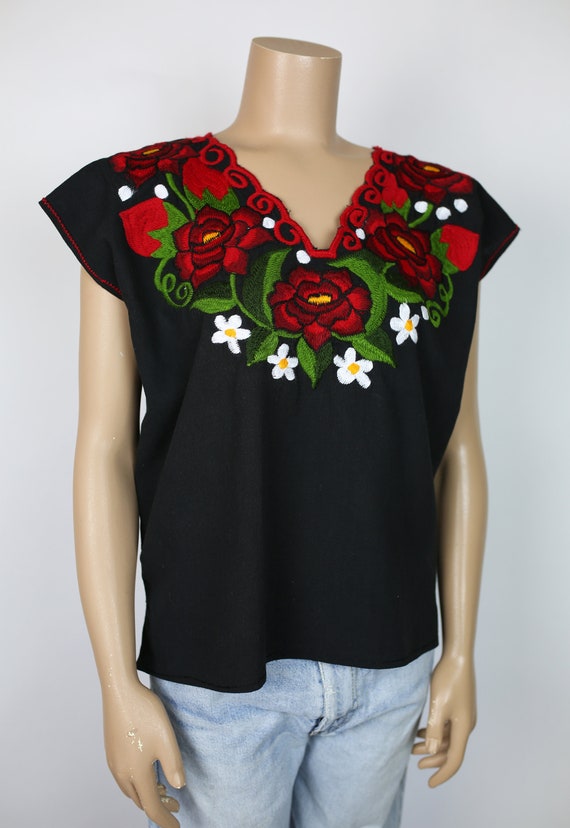 black blouse with roses