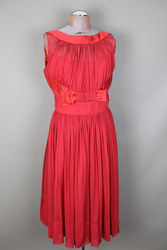 cocktail dress with sheer overlay