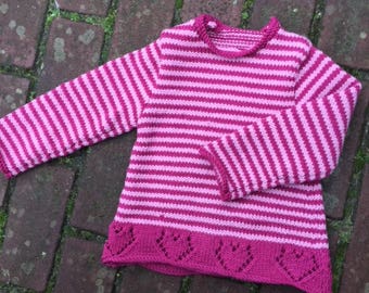 Knitting pattern girl's sweater with openwork hearts