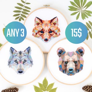 May include: Three embroidery hoops with geometric animal designs. The hoops are white with a wooden frame. The designs are a fox, a wolf, and a bear. The text "ANY 3" and "15$" are visible in the image.