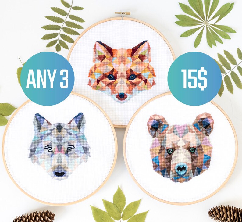May include: Three embroidery hoops with geometric animal designs. The hoops are white with a wooden frame. The designs are a fox, a wolf, and a bear. The text "ANY 3" and "15$" are visible in the image.