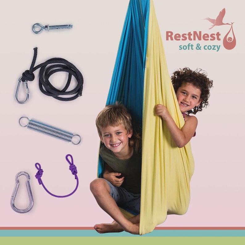 restNest kids sensory swing chair with spring suspension, indoor hammock swing for active play and calming movement, Montessori-inspired kids room decor made from soft cotton fabric for sensory regulation and cozy relaxation.