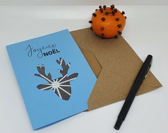 Carte de Noël scandinave bleue fait main fournie avec une enveloppe en papier recyclé