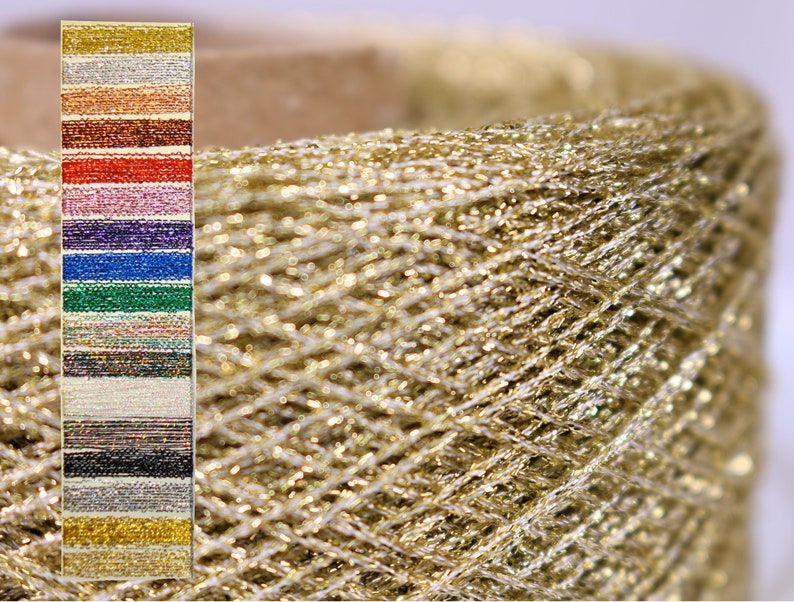 May include: A close-up of a spool of gold metallic yarn. A colour chart of various metallic yarn colours is on the left. The colours include gold, silver, red, blue, green, and purple. The yarn is likely used for crafting and textile projects.