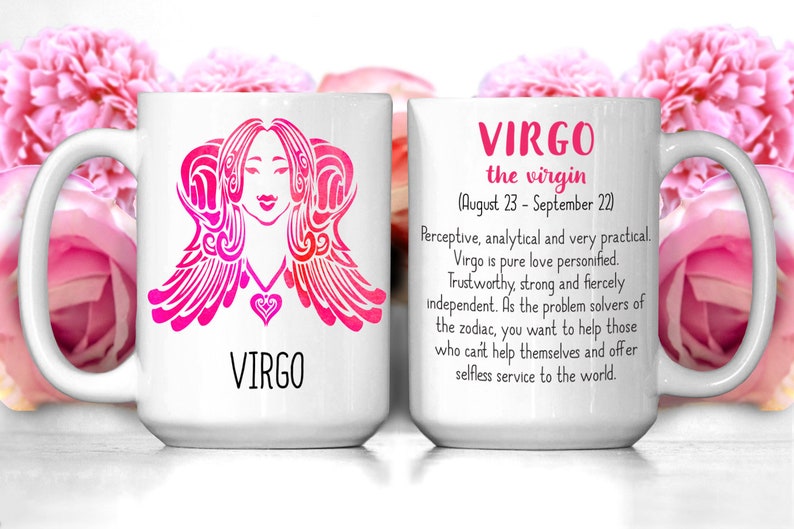 May include: White ceramic mug with a pink and white illustration of the Virgo zodiac sign. The mug has a black handle and the text "VIRGO the virgin (August 23 - September 22)" is printed on the side. The text reads: "Perceptive, analytical and very practical. Virgo is pure love personified. Trustworthy, strong and fiercely independent. As the problem solvers of the zodiac, you want to help those who can't help themselves and offer selfless service to the world."