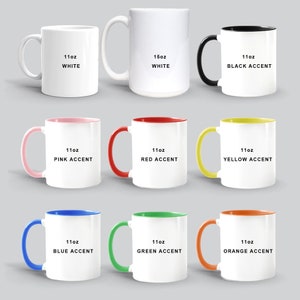 May include: Nine white ceramic mugs with different colored accents around the rim. The mugs are arranged in three rows of three. The top row has a white mug, a white mug with a 15oz label, and a black mug with a black accent. The middle row has a pink mug with a pink accent, a red mug with a red accent, and a yellow mug with a yellow accent. The bottom row has a blue mug with a blue accent, a green mug with a green accent, and an orange mug with an orange accent. Each mug has a 11oz label.