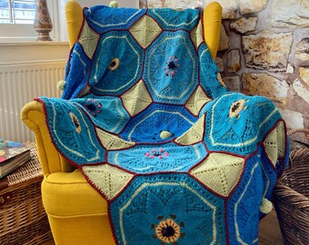 Flowery Afghan. Hand knitted from rough farm wool.