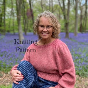 May include: A woman wearing a pink knitted sweater with a cable knit pattern sits on a log in a forest. The text "Knitting Pattern" is superimposed on the image.