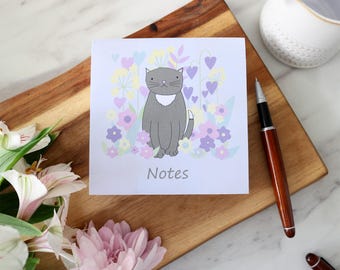 Notitieboekje met kat in bloemenontwerp