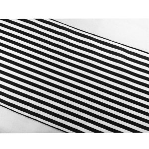 May include: Black and white striped fabric. The fabric features evenly spaced, parallel stripes. The stripes are a bold black against a white background. The fabric is folded, creating a diagonal line across the image.