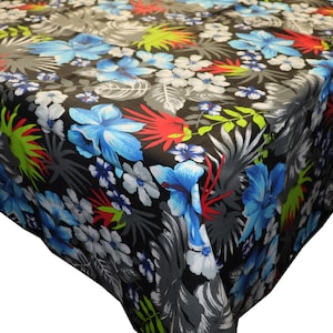 May include: Black tablecloth with a tropical floral print featuring blue, red, white, and green flowers and leaves.