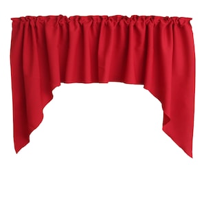 May include: A red valance with a scalloped edge and a gathered top. The valance is made of a soft, lightweight fabric and is perfect for adding a touch of color and style to any window.