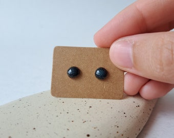 Tiny blue ceramic studs