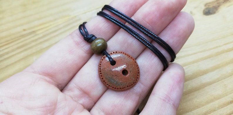 Artisan lucky button necklace