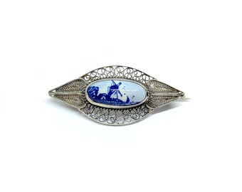 Antigo broche Delft moinho de vento holandês 1910 prata esterlina filigrana porcelana broche em forma de olho azul branco