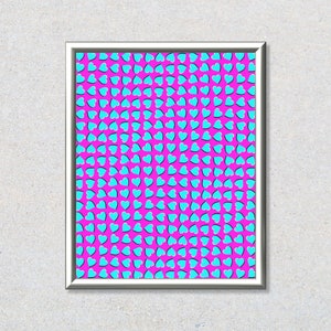 May include: A framed print with a pink background and a pattern of blue hearts. The hearts are arranged in a repeating pattern, creating an optical illusion.
