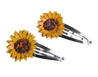 Paire de petites barrettes clic clac avec tournesol en cuir