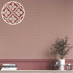 May include: Red and beige floral pattern wallpaper. The wallpaper features a repeating pattern of four-petal flowers in red against a beige background. The overall color scheme is a muted red and beige. The wallpaper is suitable for interior design projects.
