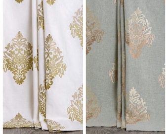 May include: Two pairs of curtains with a damask pattern. One pair is white with gold embroidery, the other is light gray with gold embroidery.