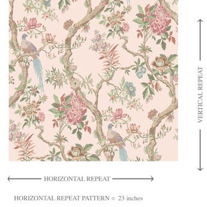 May include: Wallpaper sample with a repeating floral and bird pattern. The design features pink, green, and blue flowers, birds, and branches on a light pink background. Horizontal repeat pattern is 23 inches, vertical repeat pattern is 21.45 inches.