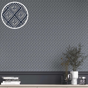 May include: Dark gray wallpaper with a repeating geometric pattern of diamonds and squares. A circular inset shows a close-up of the pattern, which features white floral designs on a navy blue background. Decorative items sit on a shelf below.
