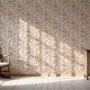 May include: A room with floral wallpaper, a wooden rocking chair with a white cushion, and a wooden cabinet. The wallpaper has a repeating pattern of pink and green flowers on a light background. Sunlight streams in from a window.