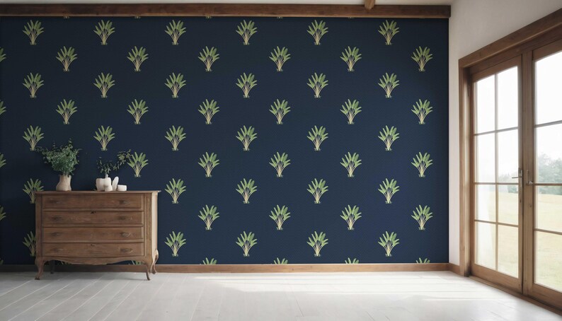 May include: A navy blue wall with a repeating pattern of stylized green and gold plant-like designs. A wooden dresser with a vase and decorative items sits in front of the wall. A window and wooden trim are visible.