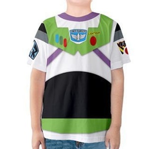 May include: White short-sleeved t-shirt with a printed design of Buzz Lightyear's space ranger suit. The design includes the words "Space Ranger" and "Lightyear" and features a green, black, and purple color scheme.