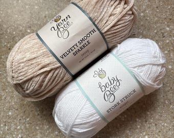 Yarn Bee Velvety Smooth Sparkle Ivory Polyester Metallic (discontinued) or Baby Bee Stork Struck Angel Lyocell/Acrylic Blend Yarn