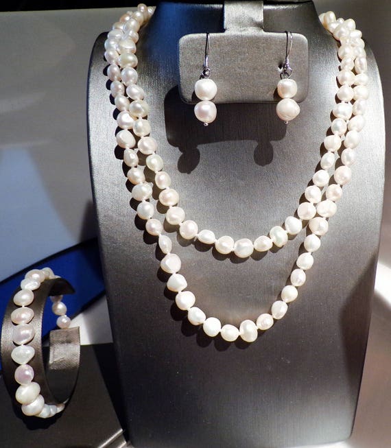 36" White Freshwater Pearls strand with coordinated earrings and bracelet