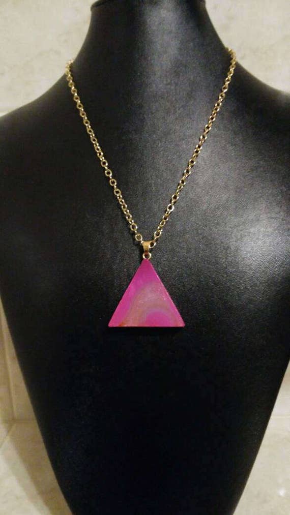Druzy in pink. Pink triangle quartz druzy with goldtone roll link chain