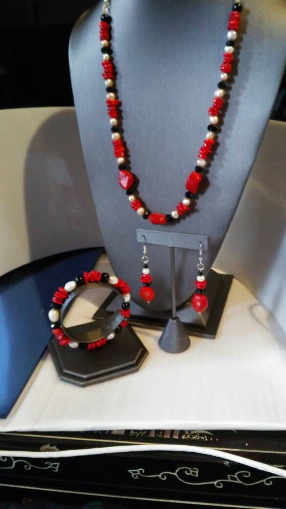 Coral wonder red coral white pearls and black onyx