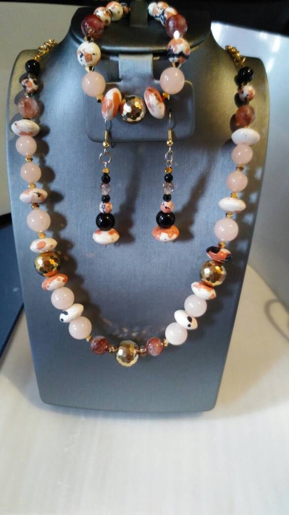 Cream and orange and black and gold oh my