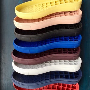 Shoe soles.Rubber TR flexible, shoes from skin, felt and knitted. Women's shoe sole.