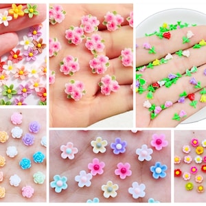 May include: Assortment of colorful flower-shaped resin embellishments. The embellishments are in various colors, including pink, blue, yellow, green, and red. They are perfect for adding a touch of whimsy to crafts, jewelry, and other projects.