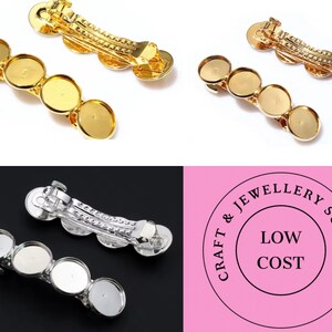 May include: Two sets of gold and silver hair clips with three round, empty, metal settings. The settings are designed to hold a cabochon or other embellishment. The clips are for crafting and jewelry making.  "Craft & Jewellery Supplies Low Cost"