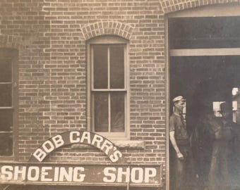 Bob Carr's Shoeing Shop Occupational RPPC: Three Men and Two Horses in Entry Door, Farrier